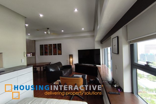 fully-furnished studio unit with parking slot at anaheim tower in the levels by filinvest