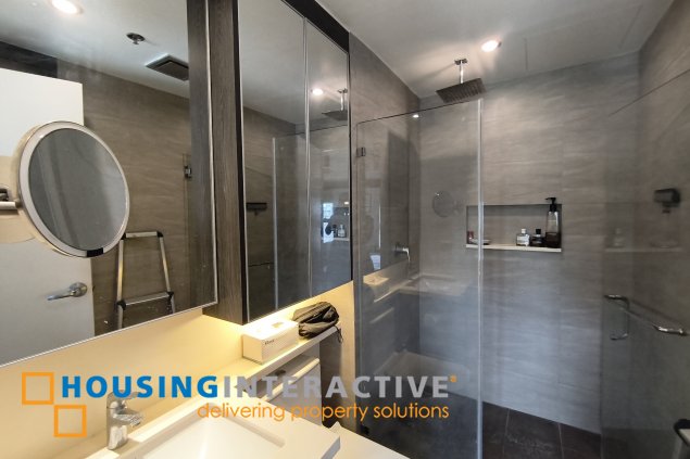 fully-furnished studio unit with parking slot at anaheim tower in the levels by filinvest