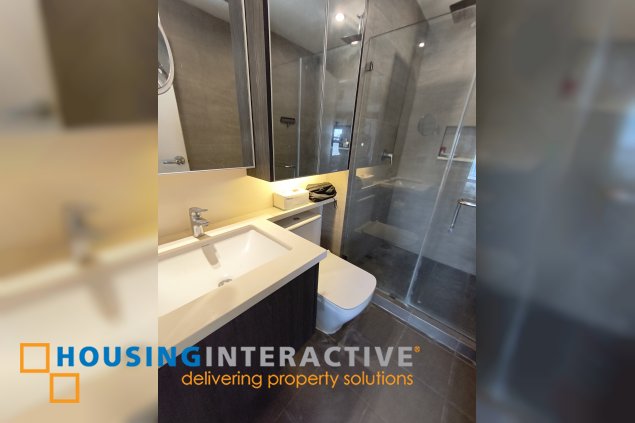 fully-furnished studio unit with parking slot at anaheim tower in the levels by filinvest