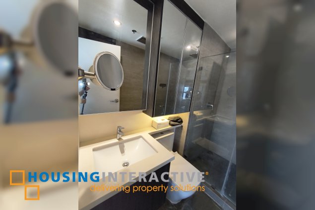 fully-furnished studio unit with parking slot at anaheim tower in the levels by filinvest