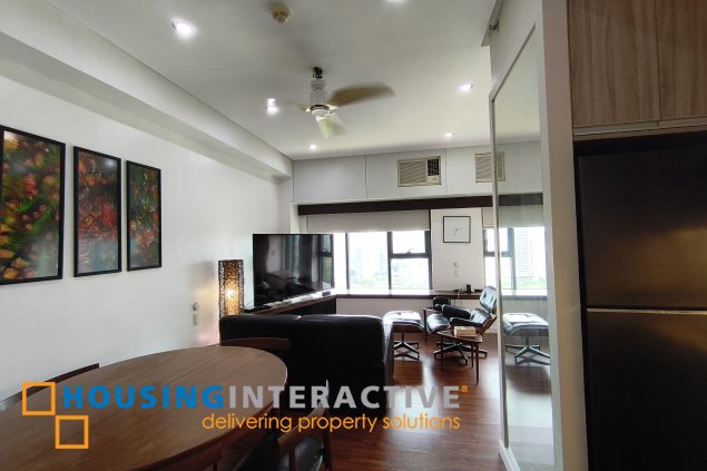 fully-furnished studio unit with parking slot at anaheim tower in the levels by filinvest