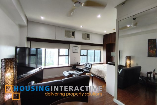 fully-furnished studio unit with parking slot at anaheim tower in the levels by filinvest