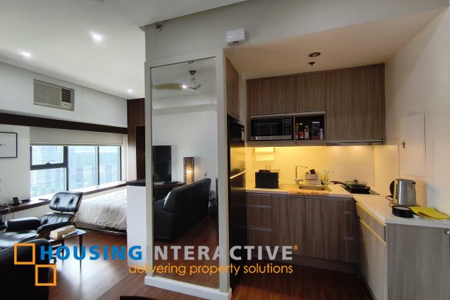 fully-furnished studio unit with parking slot at anaheim tower in the levels by filinvest