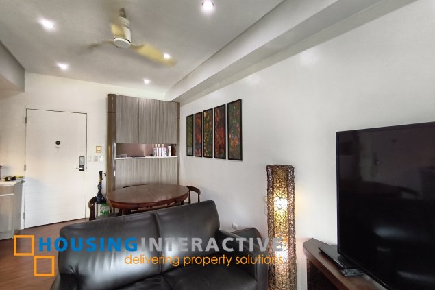 fully-furnished studio unit with parking slot at anaheim tower in the levels by filinvest