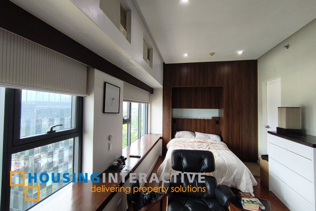 fully-furnished studio unit with parking slot at anaheim tower in the levels by filinvest