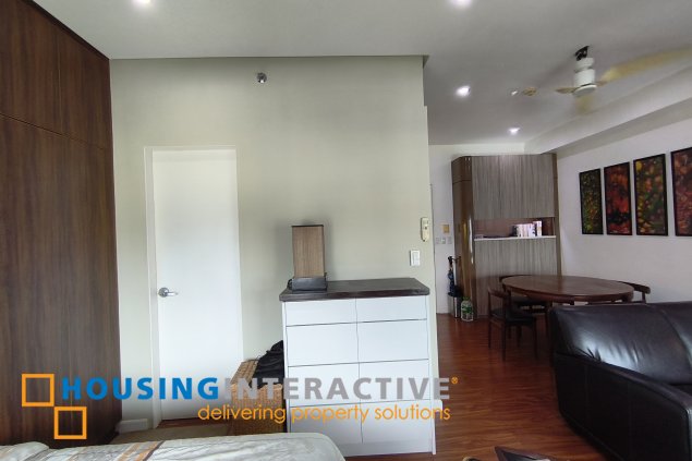 fully-furnished studio unit with parking slot at anaheim tower in the levels by filinvest