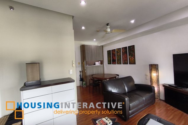 fully-furnished studio unit with parking slot at anaheim tower in the levels by filinvest