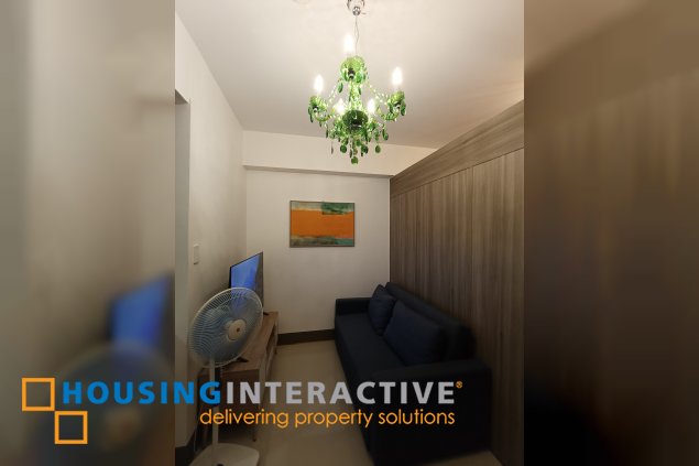 fully-furnished 1-br condominium unit with balcony at fame residences