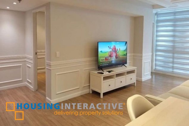 nicely furnished 2br unit with balcony and parking for rent in two serendra