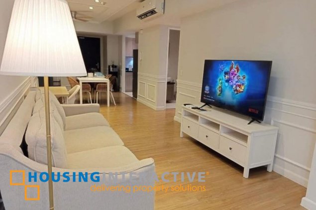 nicely furnished 2br unit with balcony and parking for rent in two serendra