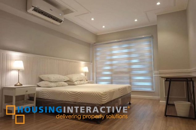 nicely furnished 2br unit with balcony and parking for rent in two serendra