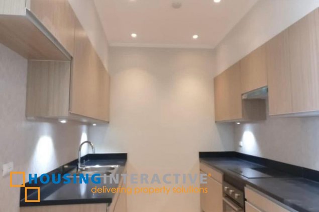 nicely furnished 2br unit with balcony and parking for rent in two serendra