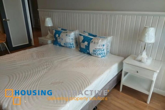 nicely furnished 2br unit with balcony and parking for rent in two serendra