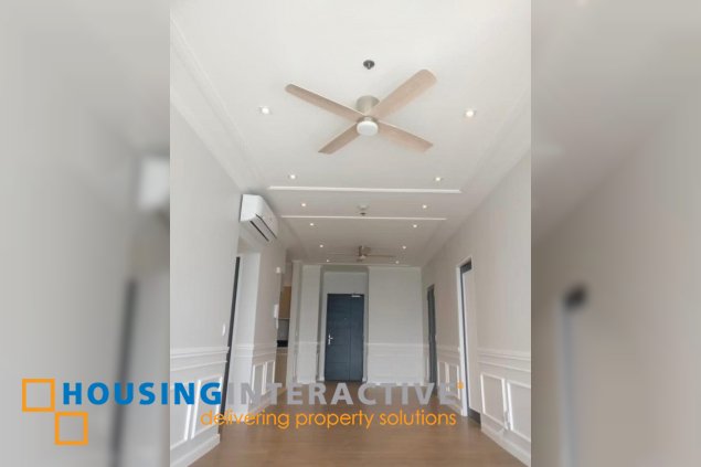 nicely furnished 2br unit with balcony and parking for rent in two serendra