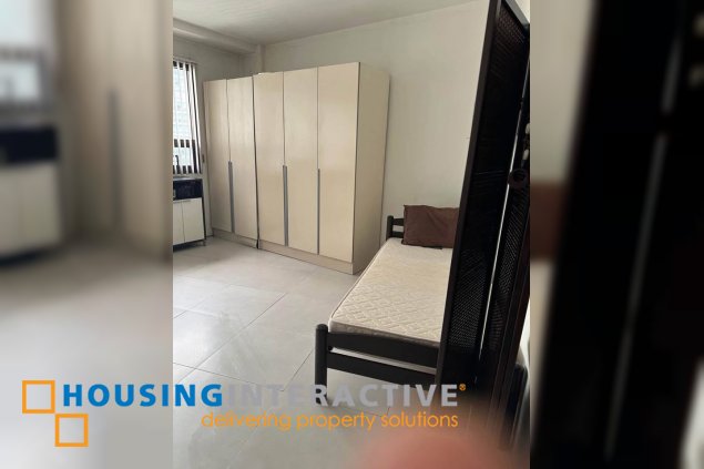 semi-furnished studio unit for sale in the icon residences