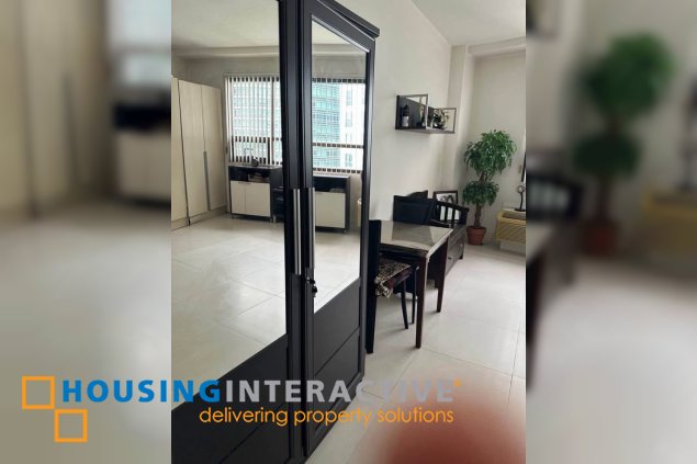 semi-furnished studio unit for sale in the icon residences