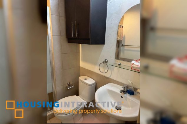 semi-furnished studio unit for sale in the icon residences