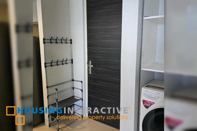 semi-furnished 1br unit with parking for sale in the infinity tower