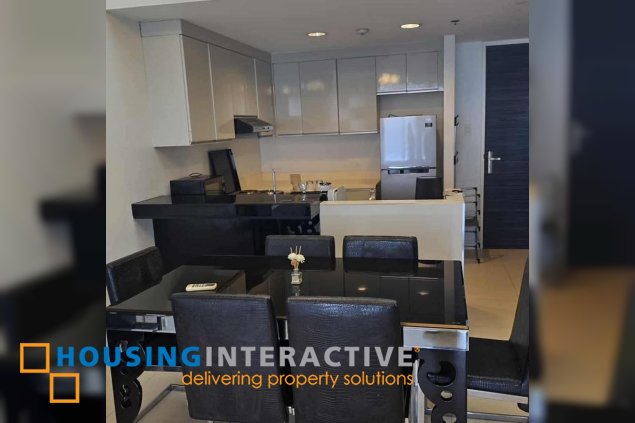 semi-furnished 1br unit with parking for sale in the infinity tower