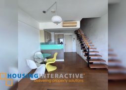 fully furnished 2br unit with parking for sale in one rockwell