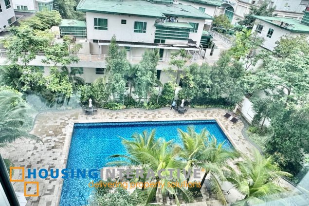 semi-furnished 3br unit with parking for sale in edades tower