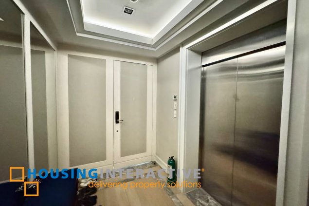 semi-furnished 3br unit with parking for sale in edades tower