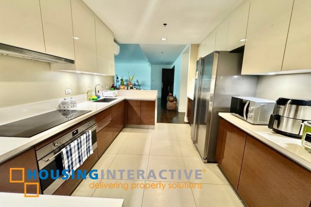 semi-furnished 3br unit with parking for sale in edades tower