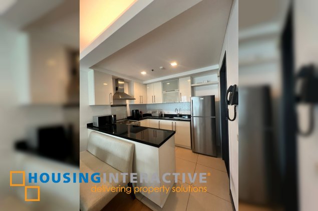 fully furnished 1br unit with balcony and parking for rent in one serendra