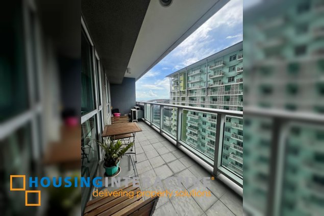 fully furnished 1br unit with balcony and parking for rent in one serendra