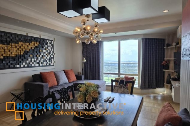 for sale: 2br unit with balcony and parking in one mckinley place