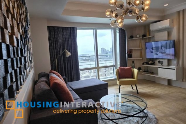 for sale: 2br unit with balcony and parking in one mckinley place