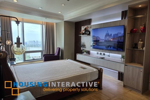 for sale: 2br unit with balcony and parking in one mckinley place