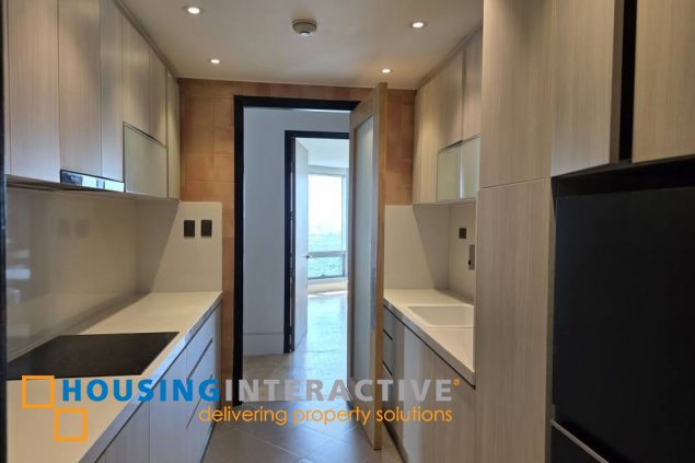 for sale: 2br unit with balcony and parking in one mckinley place