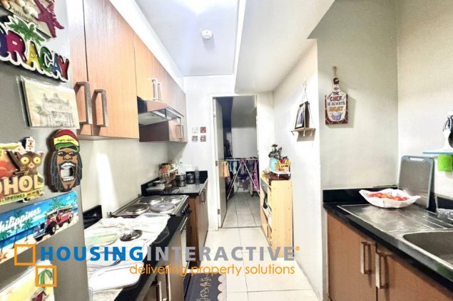 furnished 2br unit with parking for sale in two serendra