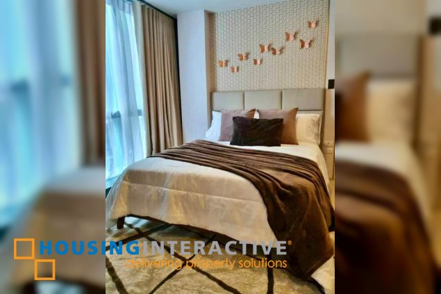 fully furnished 2br unit with balcony for lease in one uptown residences