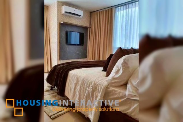 fully furnished 2br unit with balcony for lease in one uptown residences