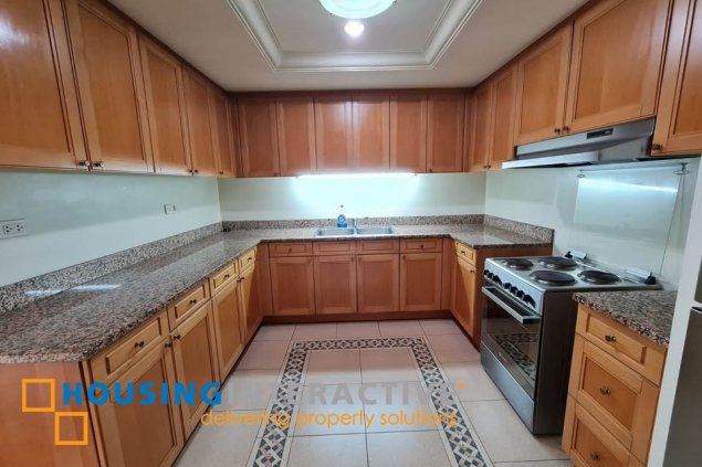 semi-furnished 2br unit with parking for lease in amorsolo squre