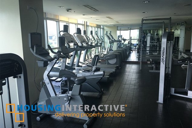 furnished 3br with parking slots in the residences at greenbelt