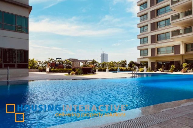 furnished 3br with parking slots in the residences at greenbelt