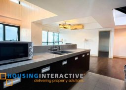 semi-furnished 3br unit with parking for sale in edades tower