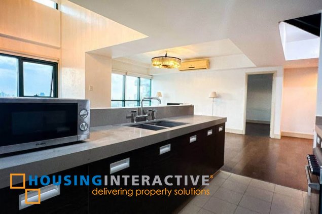 semi-furnished 3br unit with parking for sale in edades tower