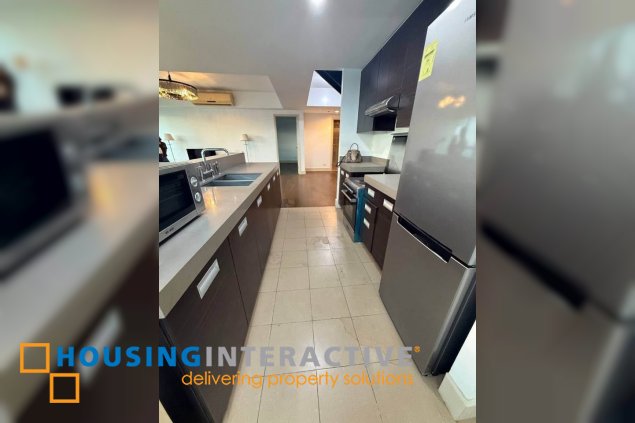 semi-furnished 3br unit with parking for sale in edades tower