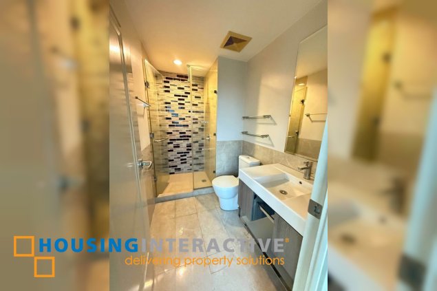 semi-furnished 3br unit with parking for sale in edades tower