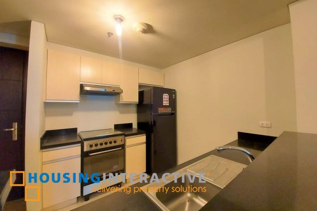 fully furnished 2br unit with parking for sale in kroma tower