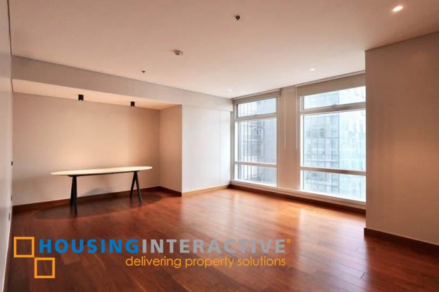 semi-furnished 3br unit with parking for rent in two roxas triangle