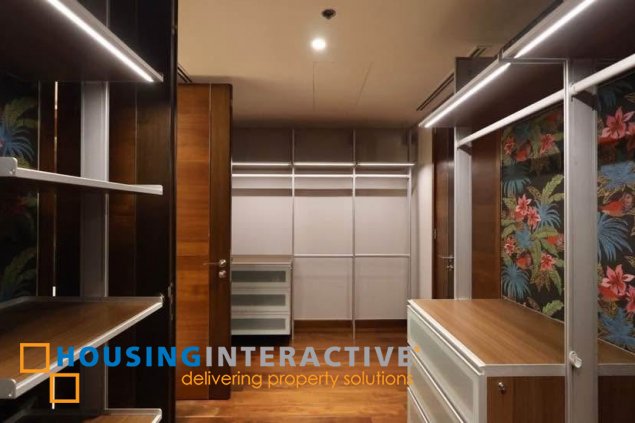 semi-furnished 3br unit with parking for rent in two roxas triangle