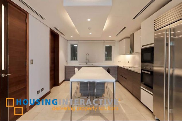 semi-furnished 3br unit with parking for rent in two roxas triangle