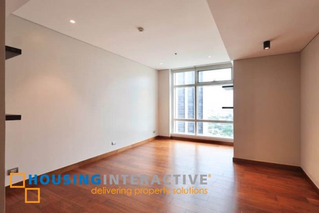 semi-furnished 3br unit with parking for rent in two roxas triangle