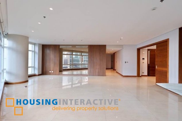 semi-furnished 3br unit with parking for rent in two roxas triangle