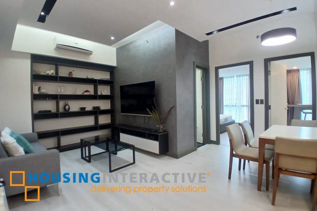 fully furnished 2br unit with parking for rent in one uptown residences